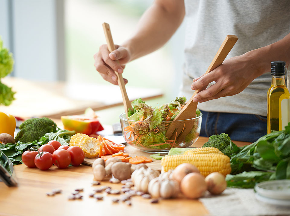 person making a salad